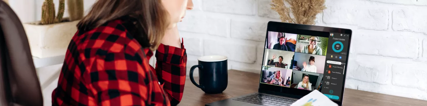 Woman attending an online meeting from home 